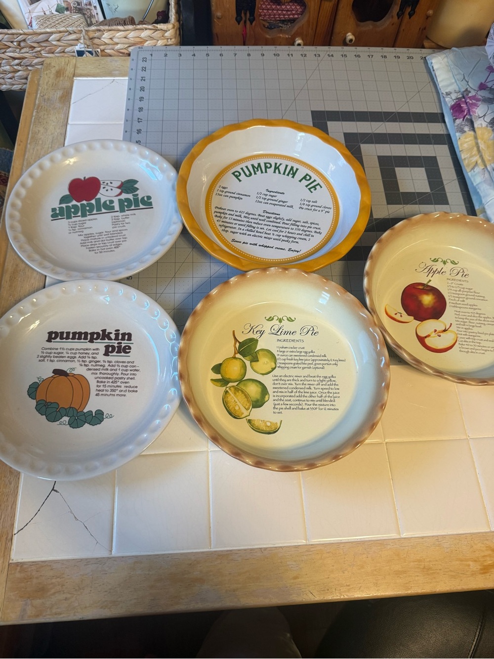 vintage stoneware pie plates featuring printed recipes.